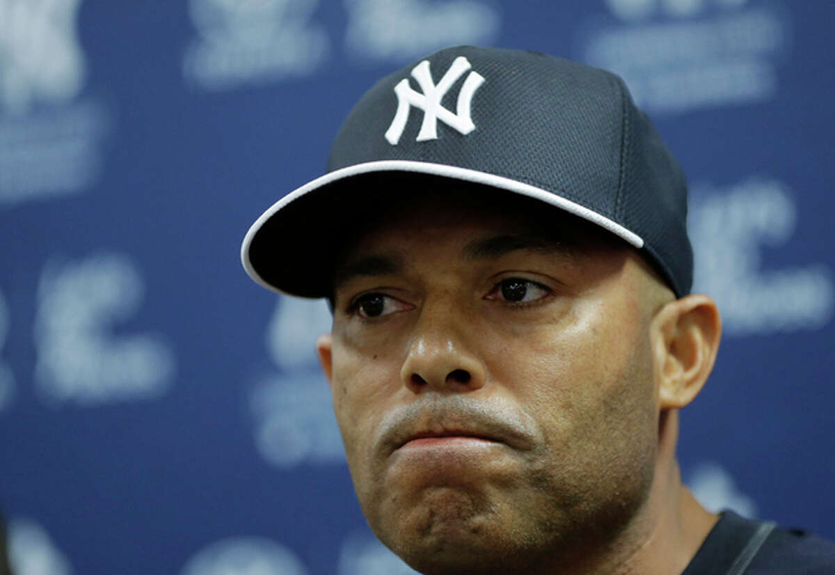 New York Yankees pitcher Mariano Rivera, who holds baseball's all-time saves record, announces his plans to retire at the end of the 2013 season during a news conference at Steinbrenner Field Saturday, March 9, 2013 in Tampa, Fla. (AP Photo/Kathy Willens)