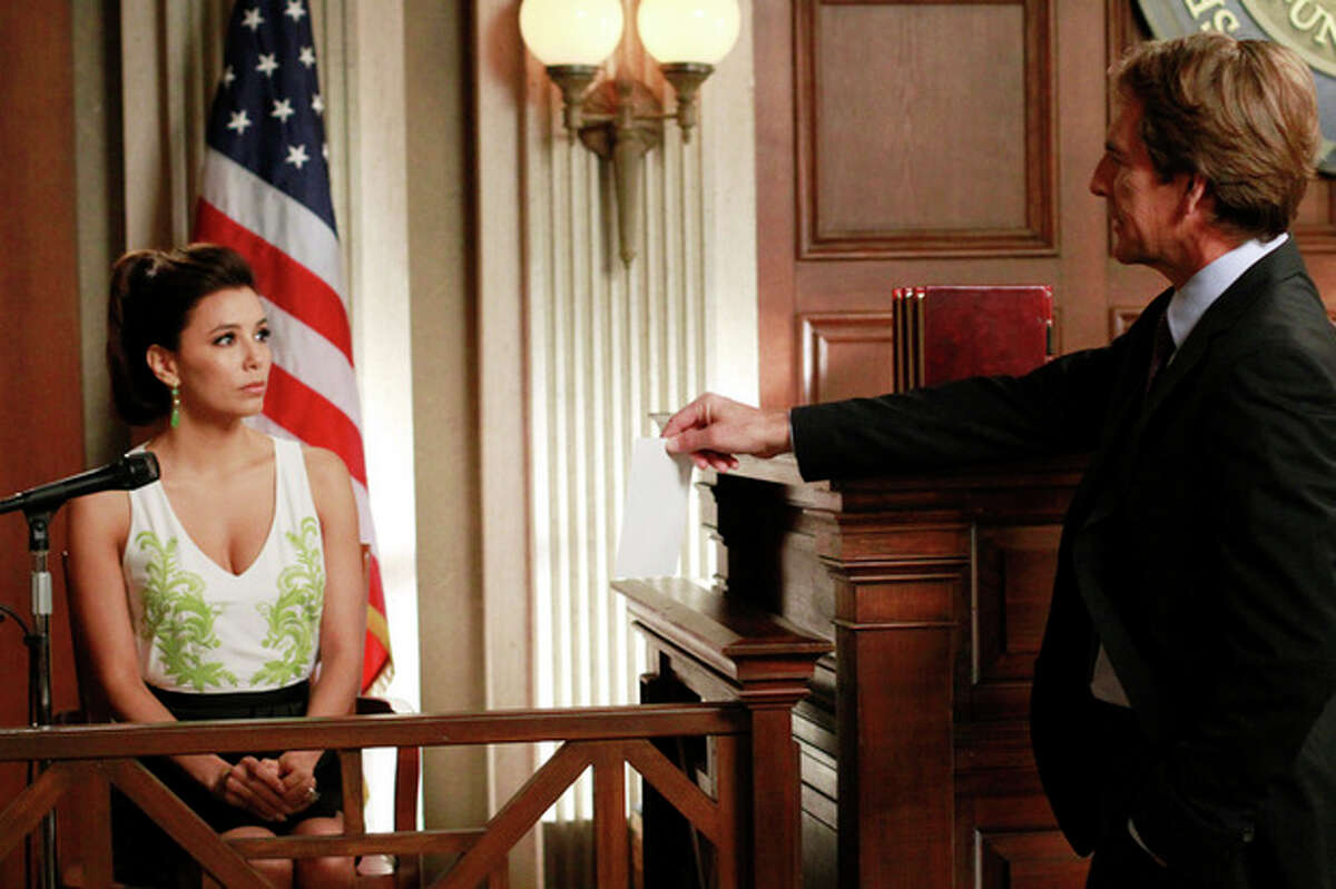 In this publicity image released by ABC, Eva Longoria, left, and Scott Bakula are shown in a scene from the series finale of "Desperate Housewives," that was aired Sunday, May 13, 2012 at 9:00p.m. EST on ABC. (AP Photo/ABC, Ron Tom)