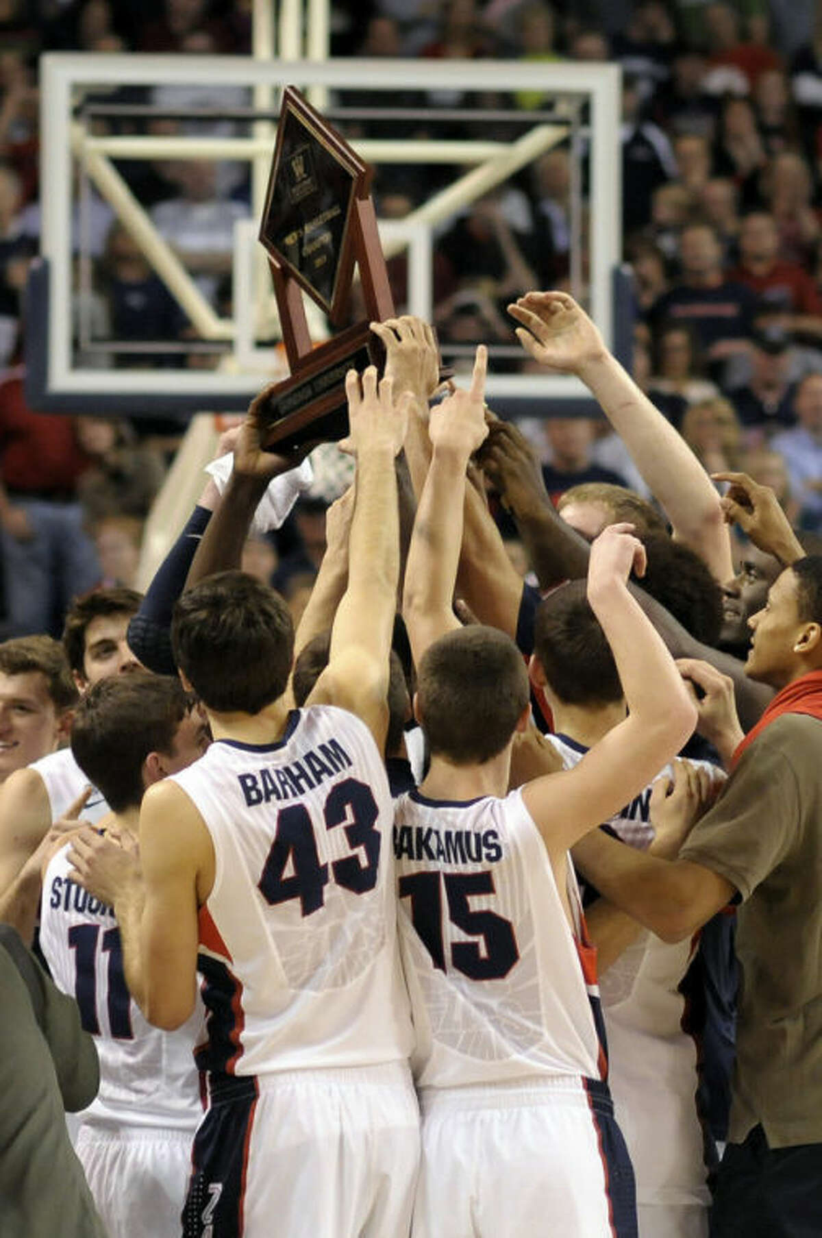 Gonzaga celebrates their West Coast Conference Championship after an NCAA college basketball game against Portland, Saturday, March 2, 2013, in Spokane, Wash. Gonzaga won 81-52. (AP Photo/Jed Conklin)