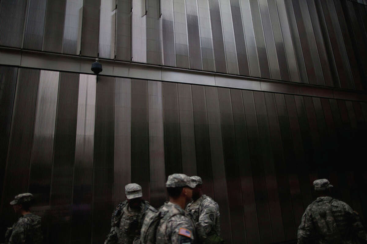 Members of the U.S. National Guard exchange shifts at the ground zero construction site in New York, Monday, Sept. 5, 2011. Sept. 11, 2011 will mark the tenth anniversary of the terrorist attacks in the United States.(AP Photo/Oded Balilty)