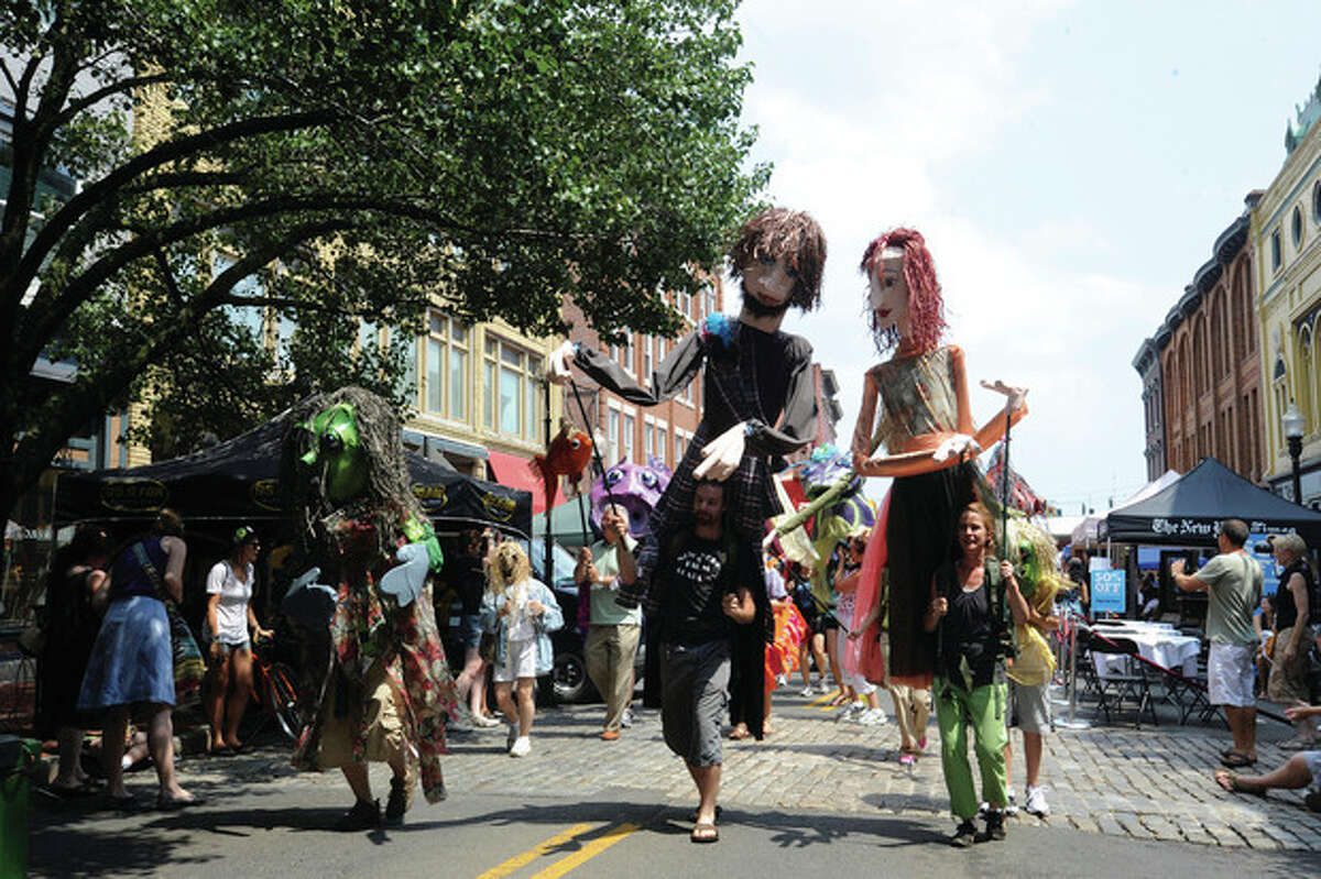 The SONO Arts Festival puppet parade on Washington Street. hour photo/matthew vinci