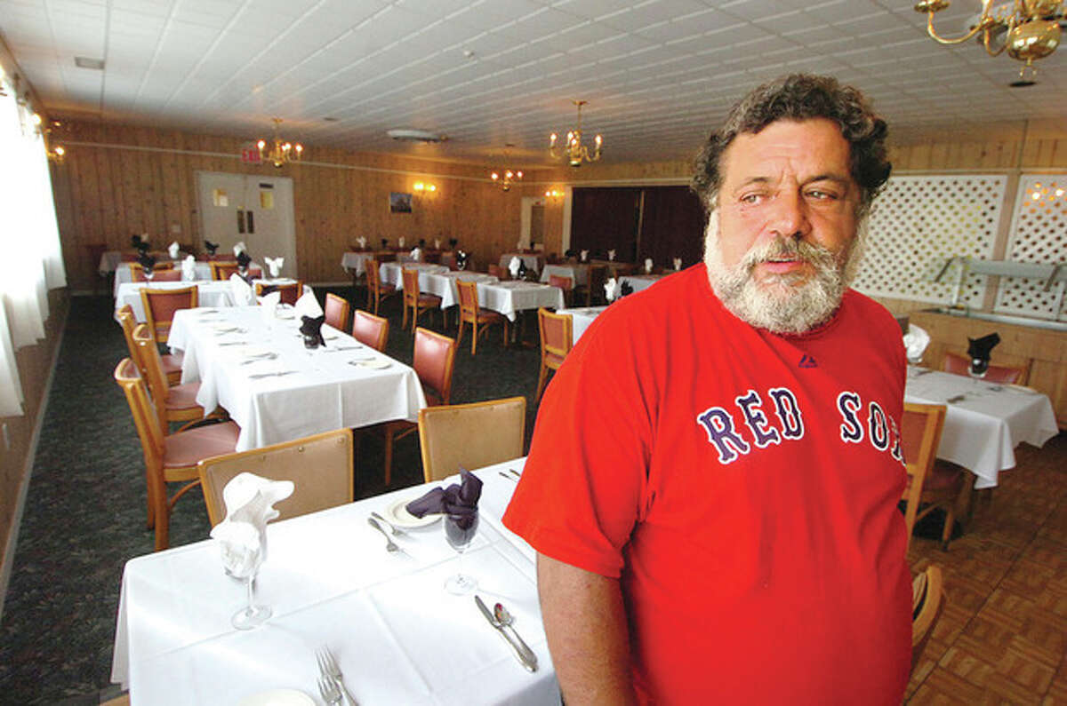 Hour Photo/ Alex von Kleydorff Sam Tuozzolo, president of The Sons of Italy, stands in the Tivoli Dinning room