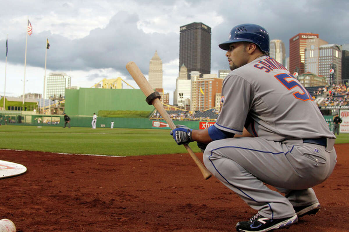 New York Mets starting pitcher Johan Santana waits on deck to bat against the Pittsburgh Pirates in the second inning of the baseball game on Monday, May 21, 2012, in Pittsburgh. (AP Photo/Keith Srakocic )