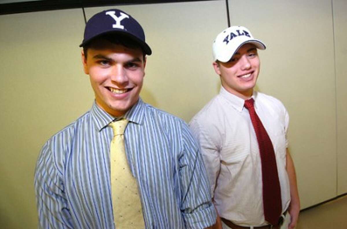 Photo/Alex von Kleydorff. Staples High School seniors Chris Coyne and Pat Murray sign to play football at Yale.