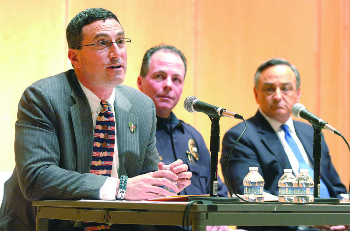 Redding Police Chief Doug Fuchs speaks about the media during lecture series with Wilton Police Captain John Lynch and News 12 News Director/Anchor Tom Appleby at The Wilton Library Tuesday night