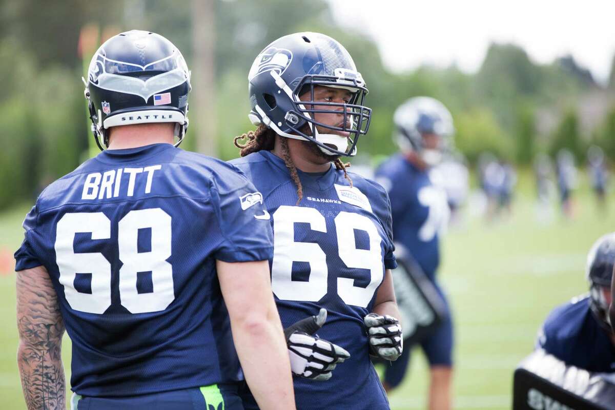 Center Justin Britt and tackle Terry Poole will battle for spots on the Seahawks offensive line in 2016.