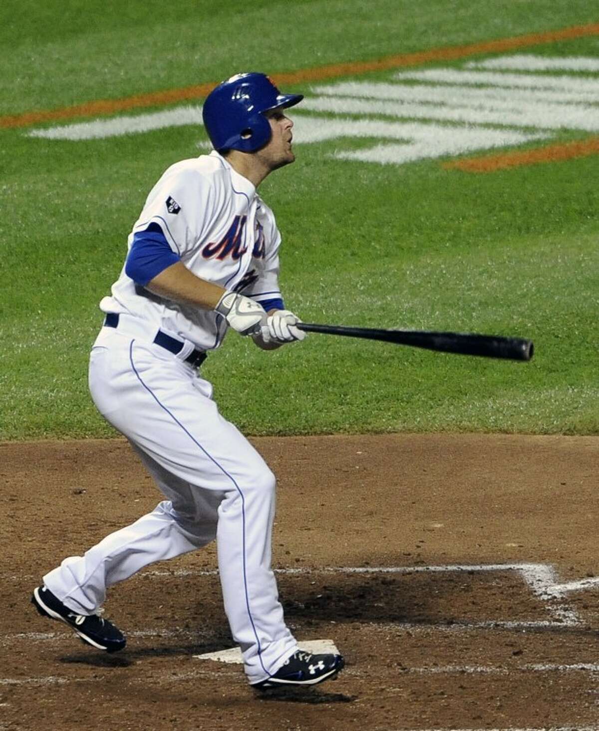 New York Mets' Lucas Duda watches his three-run home run off St. Louis Cardinals starting pitcher Adam Wainwright in the sixth inning of a baseball game on Friday, June 1, 2012, at Citi Field in New York. (AP Photo/Kathy Kmonicek)