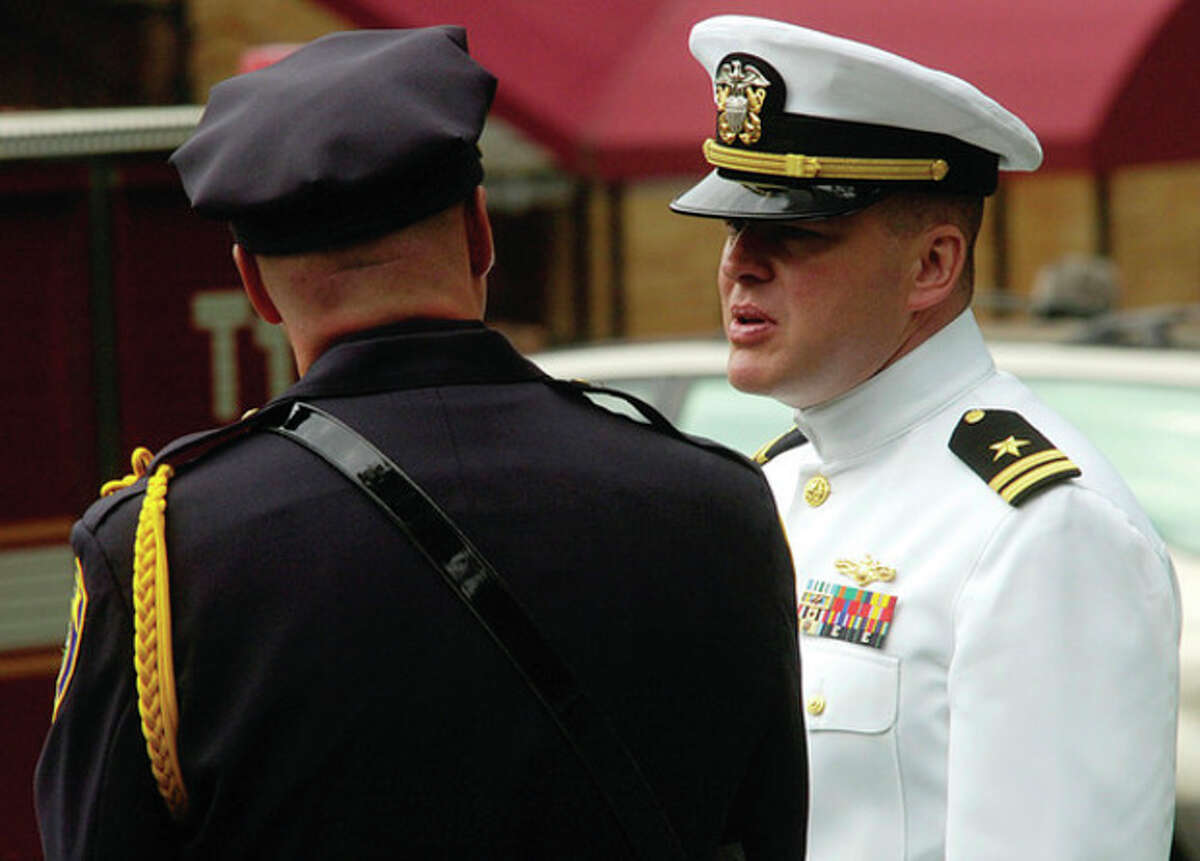 A solemn goodbye as hundreds mourn fallen Stamford SEAL