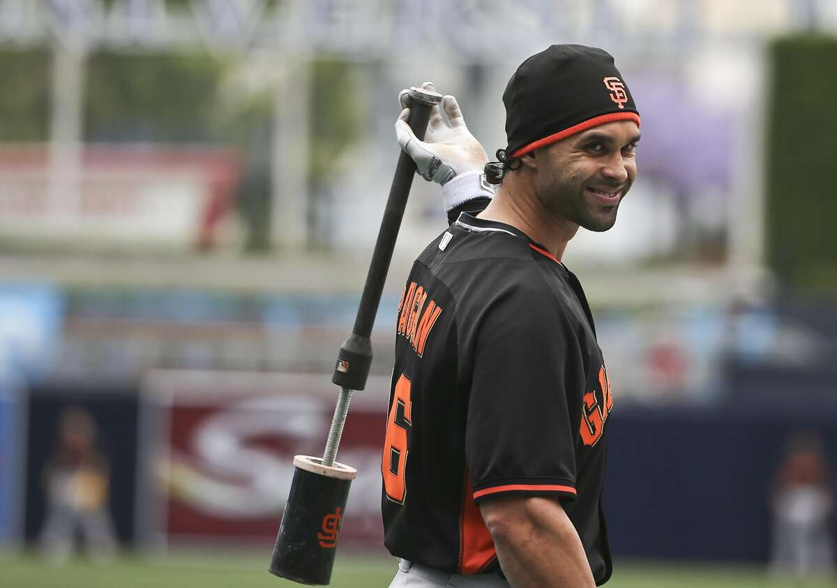 San Francisco Giants' Angel Pagan outside the batting cage prior to a baseball game against the San Diego Padres Tuesday, May 17, 2016, in San Diego. (AP Photo/Lenny Ignelzi)