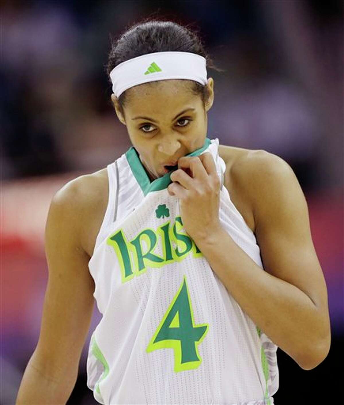 Notre Dame guard Skylar Diggins (4) looks down in the second half of the women's NCAA Final Four college basketball tournament semifinal against Connecticut, Sunday, April 7, 2013, in New Orleans. UConn won 83-65.(AP Photo/Dave Martin)