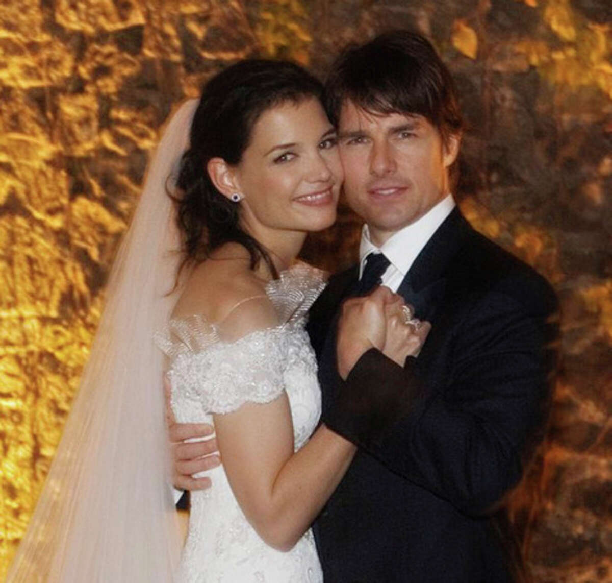 FILE - In this Nov. 18, 2006 file photo released by Rogers and Cowan, actor Tom Cruise and actress Katie Holmes pose in their wedding attire at the 15th-century Odescalchi Castle overlooking Lake Bracciano outside of Rome. Cruise and Homes are calling it quits after five years of marriage. Holmes' attorney Jonathan Wolfe said Friday June 29, 2012 that the couple is divorcing, but called it a private matter for the family. (AP Photo/Robert Evans, File)