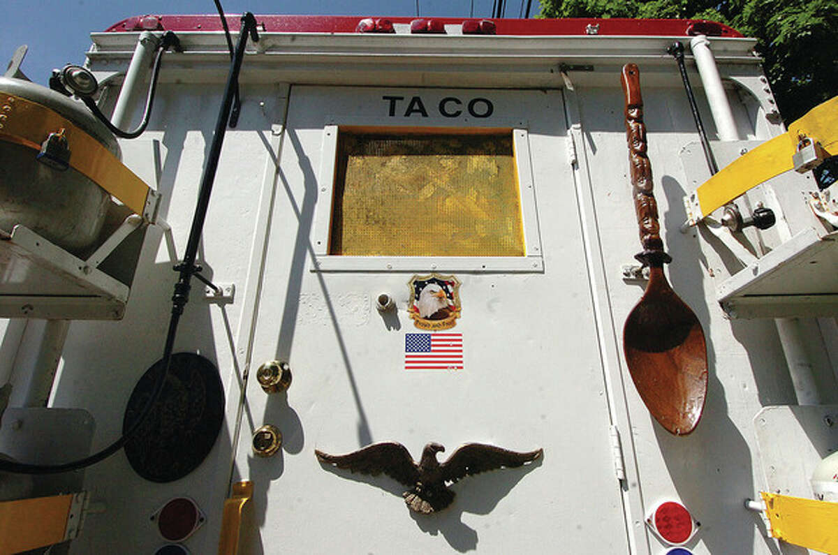 Hour Photo/ Alex von Kleydorff. You need big spoons to make big Tortas at Taqueria Las Salsas truck on Veterans Green in Norwalk