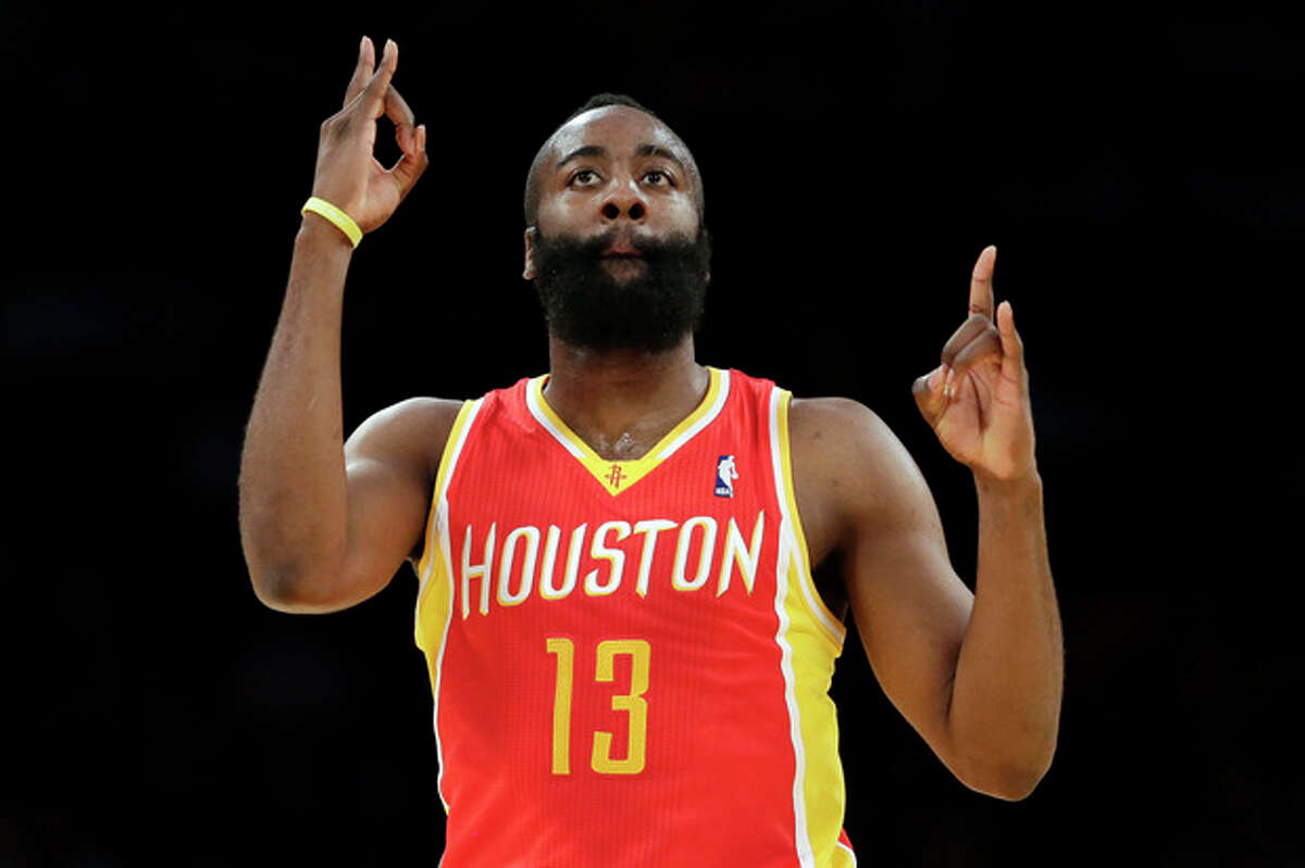 Houston Rockets' James Harden reacts after making a 3-pointer during the first half of an NBA basketball game against the Los Angeles Lakers in Los Angeles, Wednesday, April 17, 2013. (AP Photo/Jae C. Hong)