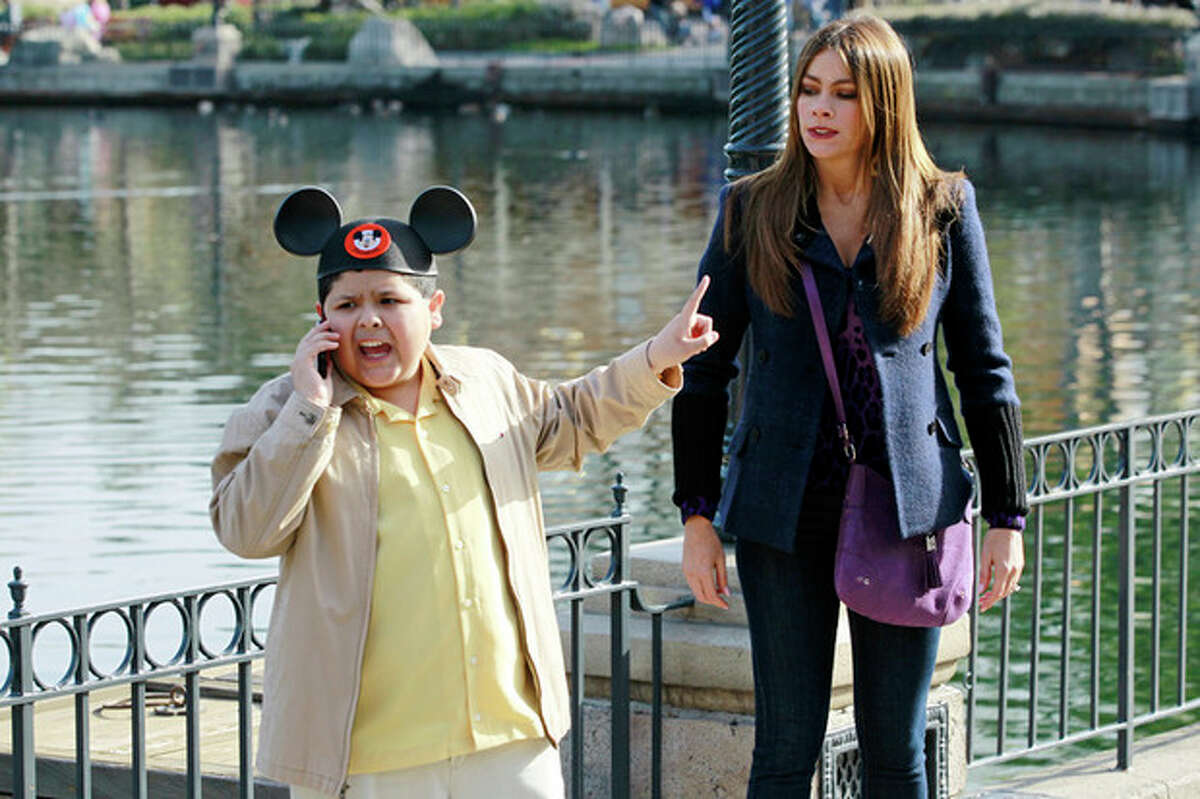 In this publicity photo released by ABC, Rico Rodriguez, left, and Sofia Vergara are shown in a scene from ?“Modern Family." The program was nominated for an Emmy award for outstanding comedy series on Thursday, July 19, 2012. The 64th annual Primetime Emmy Awards will be presented Sept. 23 at the Nokia Theatre in Los Angeles, hosted by Jimmy Kimmel and airing live on ABC. (AP Photo/ABC, Peter ?“Hopper?” Stone)