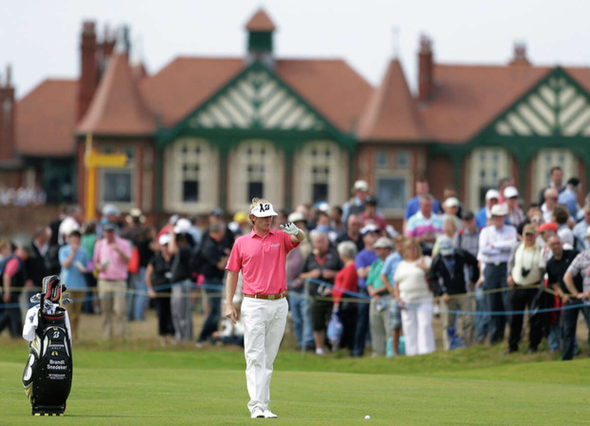 Brandt Snedeker of the United States prepares to play a shot on the second fairway at Royal Lytham & St Annes golf club during the third round of the British Open Golf Championship, Lytham St Annes, England, Saturday, July 21, 2012. (AP Photo/Peter Morrison)