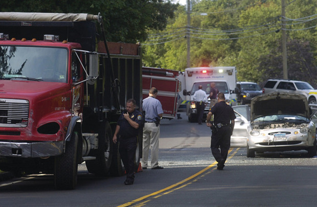 Police: Woman killed in dump truck accident