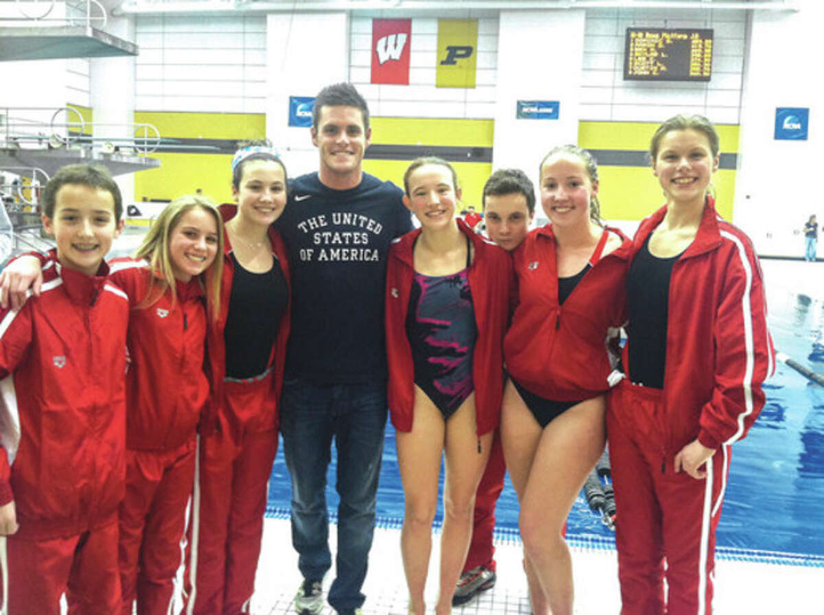 Contributed photo The New Canaan-based Whirlwind Dive Team participated in thr Junior East Nationals last weekend. One of the highlights was meeting Olympic gold medalist David Boudia. Spending together are, from left, Timmy Luz, Anne Farley, Rachel Burston, Boudia, Kylie Towbin, Sean Burston, Kirsten Parkinson, and Genevieve Angerame