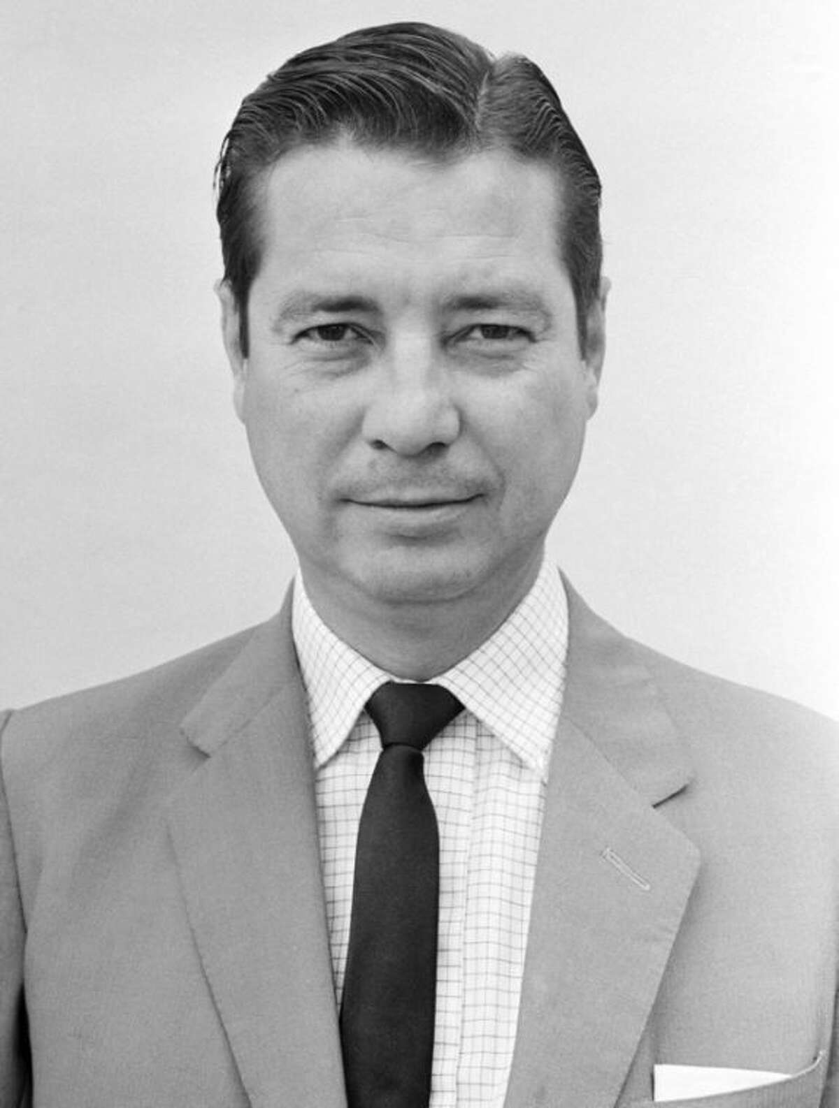 FILE - This 1963 file photo shows George McArthur, Chief of Bureau in Cairo for The Associated Press. McArthur, a former AP foreign correspondent who reported all over the world and spent years in Saigon covering the Vietnam war, has died. He was 88. His wife, Eva Kim McArthur said he died Friday night, April 12, 2013 in a hospice in Fairfax County, Va., of complications from a stroke. (AP Photo)