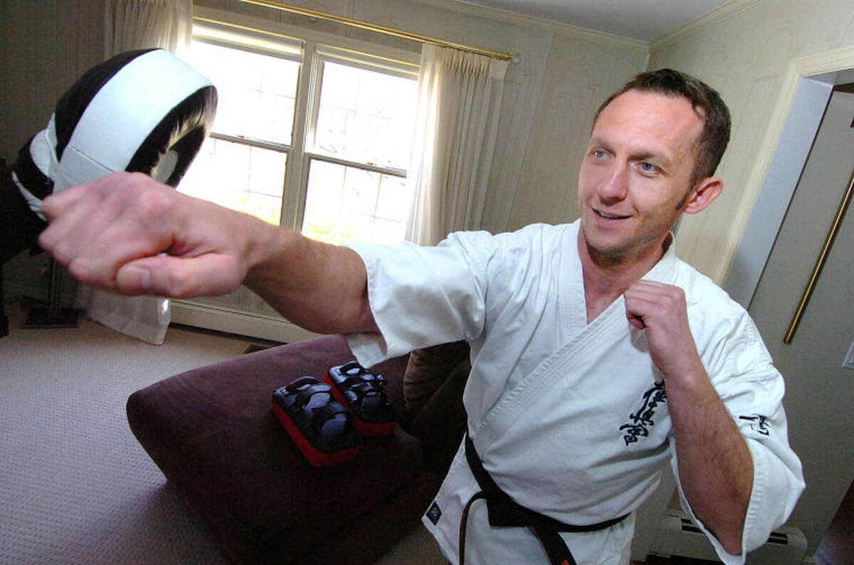 Hour Photo/Alex von Kleydorff Marek Mroz of Wilton, who placed third at the U.S. Weight Category Karate Championships. Mroz will represent North America in the Kyokushinkaikan Karate Championships in Japan later this month. The 36-year-old Polish national will face off against Alejandro Navarro, an accomplished fighter from Spain.