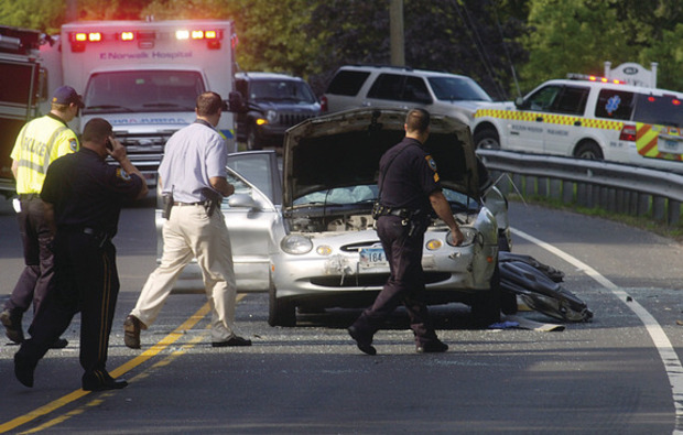 Police: Woman killed in dump truck accident