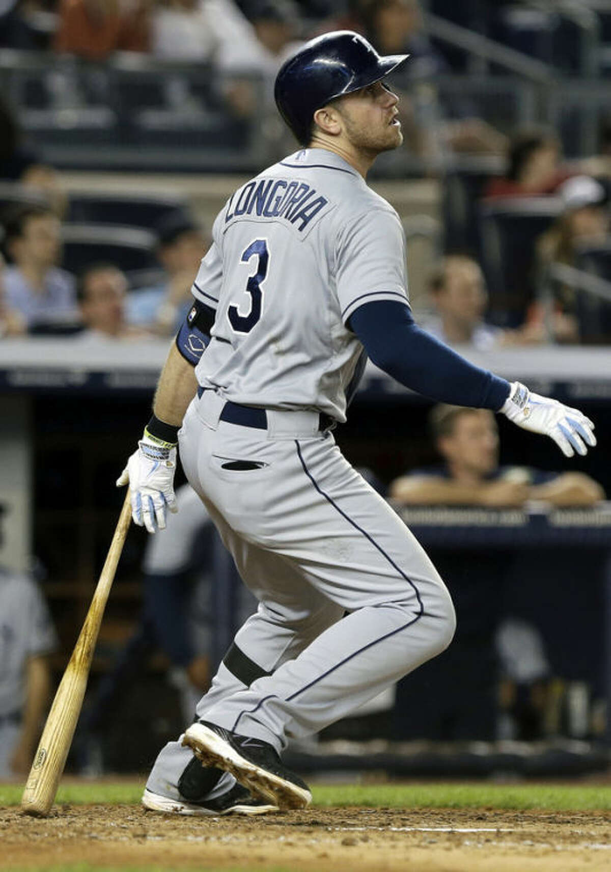Tampa Bay Rays' Evan Longoria (3) watches a ball he hit for a home run during the eighth inning of a baseball game against the New York Yankees, Thursday, June 20, 2013, in New York. (AP Photo/Frank Franklin II)