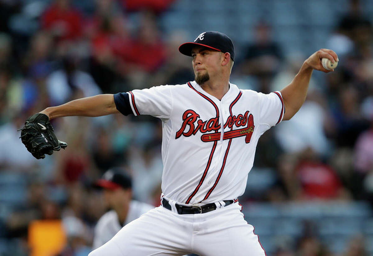 Atlanta Braves starting pitcher Mike Minor works in the first inning of a baseball game against the New York Mets, Thursday, June 20, 2013, in Atlanta. (AP Photo/John Bazemore)