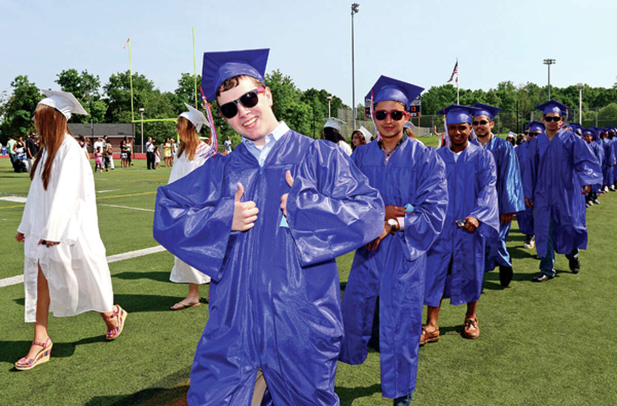Brien McMahon High School Class of 2013 celebrates their graduation Friday. Hour photo / Erik Trautmann