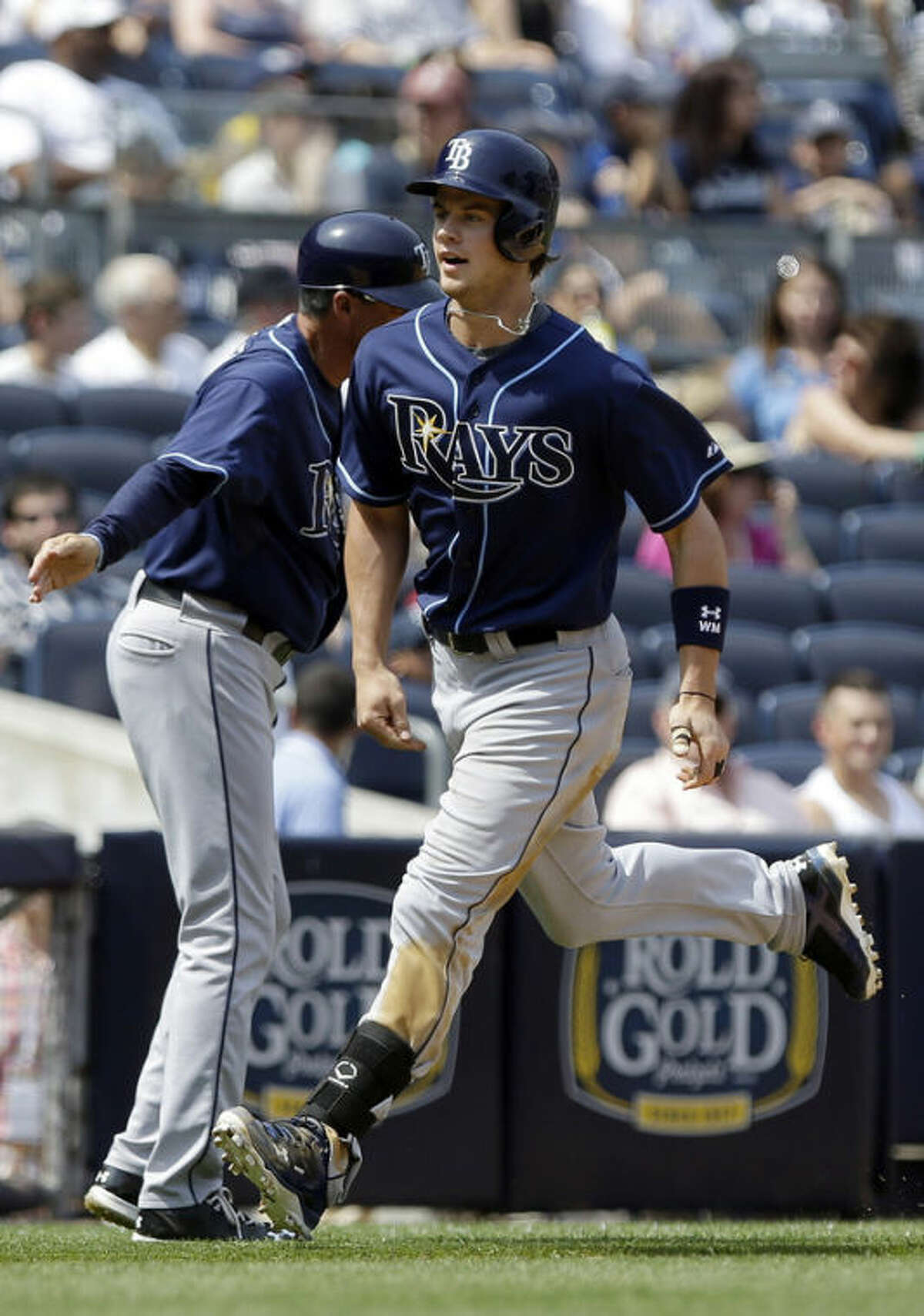 Tampa Bay Rays' Wil Myers heads to home plate after hitting a grand slam during the sixth inning of a baseball game Saturday, June 22, 2013, in New York. (AP Photo/Frank Franklin II)
