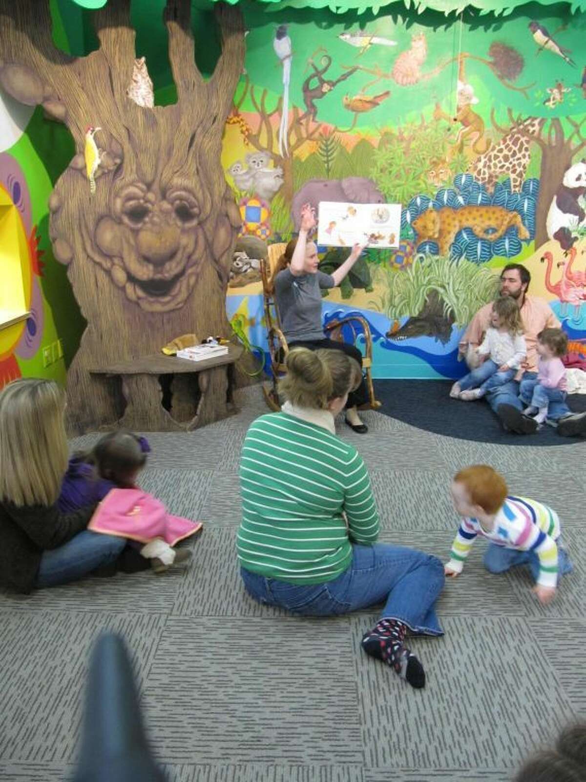 Children and parents enjoy story times as the Wilton Library’s summer reading program with activities for toddlers to teens.