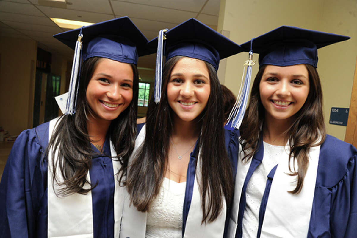 Katie Glick, Zoe Cohen and Izzy Claverloux at the Staples High School graduation on Friday. Hour photo/Matthew Vinci