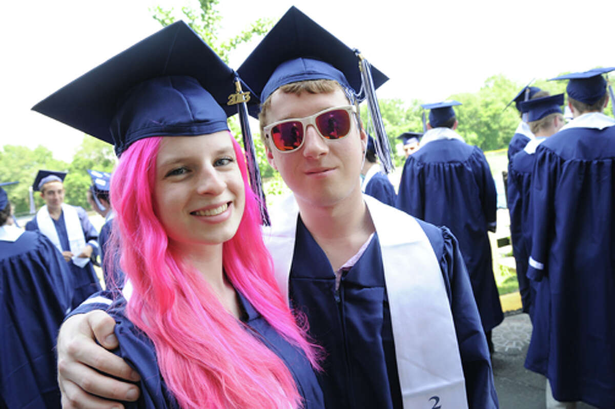 Sara Zimmerman and Riley Gonnet at the Staples High School graduation on Friday. Hour photo/Matthew Vinci