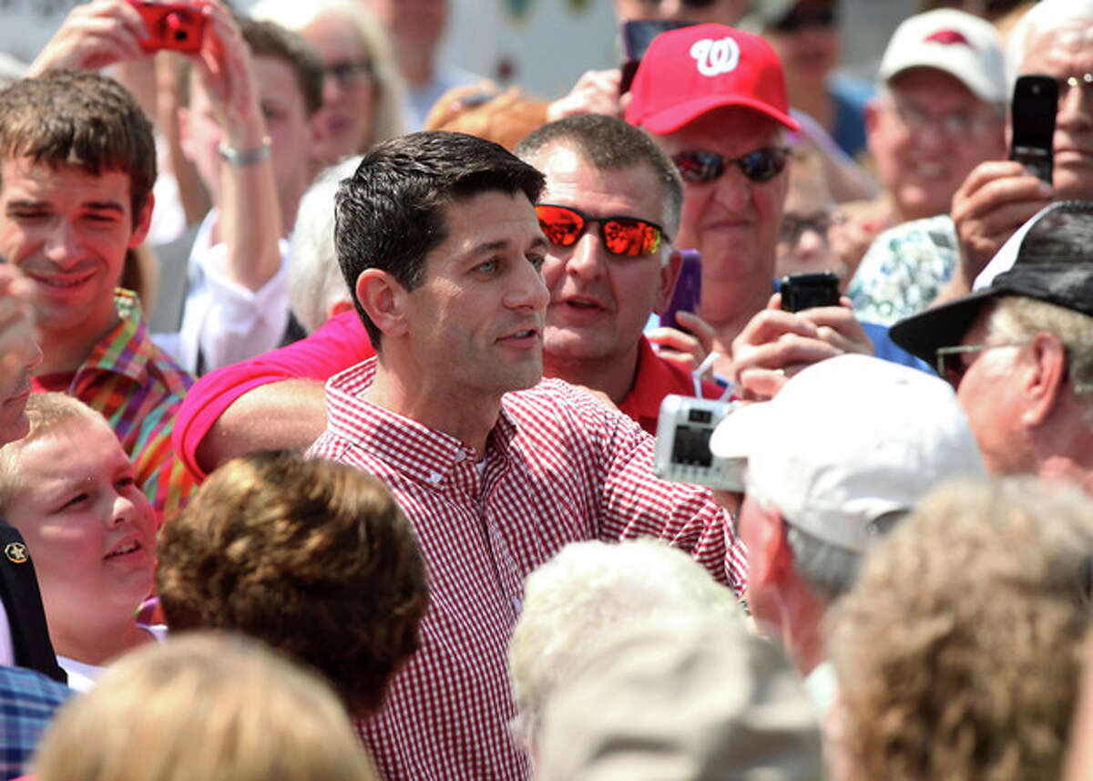 Republican Vice Presidential candidate, Rep. Paul Ryan, R-Wis. makes an appearance at the Iowa State Fair in Des Moines, Monday, Aug. 13, 2012. (AP Photo/Conrad Schmidt)