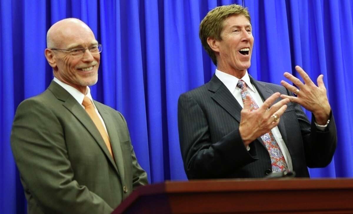 Defense attorneys Don West, left, and Mark O'Mara address the media following the not guilty verdict for their client George Zimmerman in Seminole Circuit Court in Sanford, Fla. on Saturday, July 13, 2013. Jurors found Zimmerman not guilty of second-degree murder in the fatal shooting of 17-year-old Trayvon Martin in Sanford, Fla. (AP Photo/Gary W. Green, Pool)