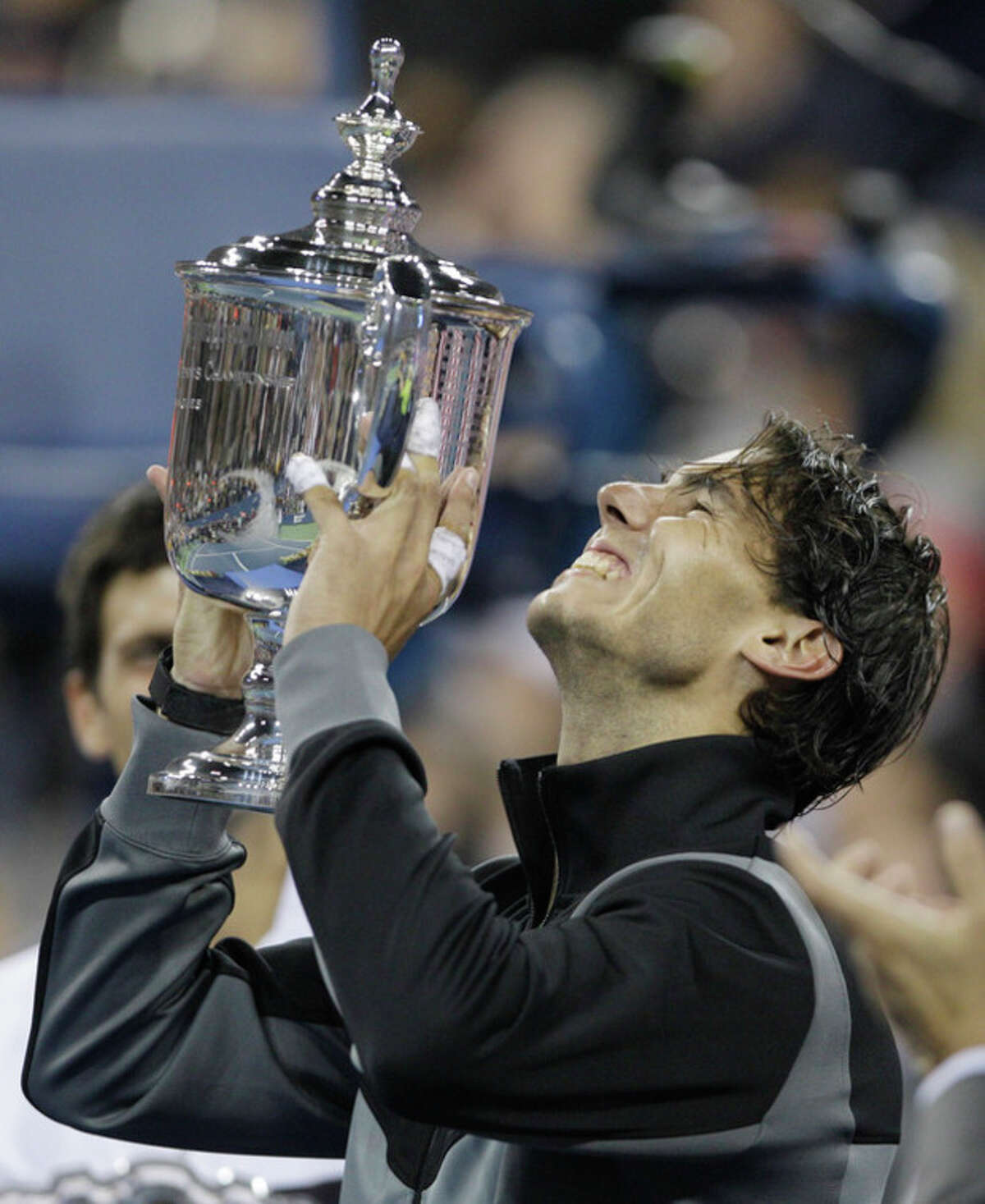 FILE - This Sept. 13, 2010 file photo shows Rafael Nadal, of Spain, holding the championship trophy after defeating Novak Djokovic, of Serbia, to win the men's championship match at the U.S. Open tennis tournament in New York. The U.S. Open says that Nadal has withdrawn from the last Grand Slam tennis tournament of the year because of injury. (AP Photo/Charles Krupa, File)