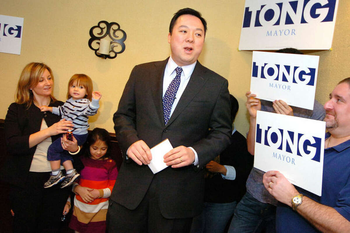 State Rep. William Tong surrounded by family and supportersannounces his run for Stamford Mayor at Sorrento Restaurant in Stamford Monday.