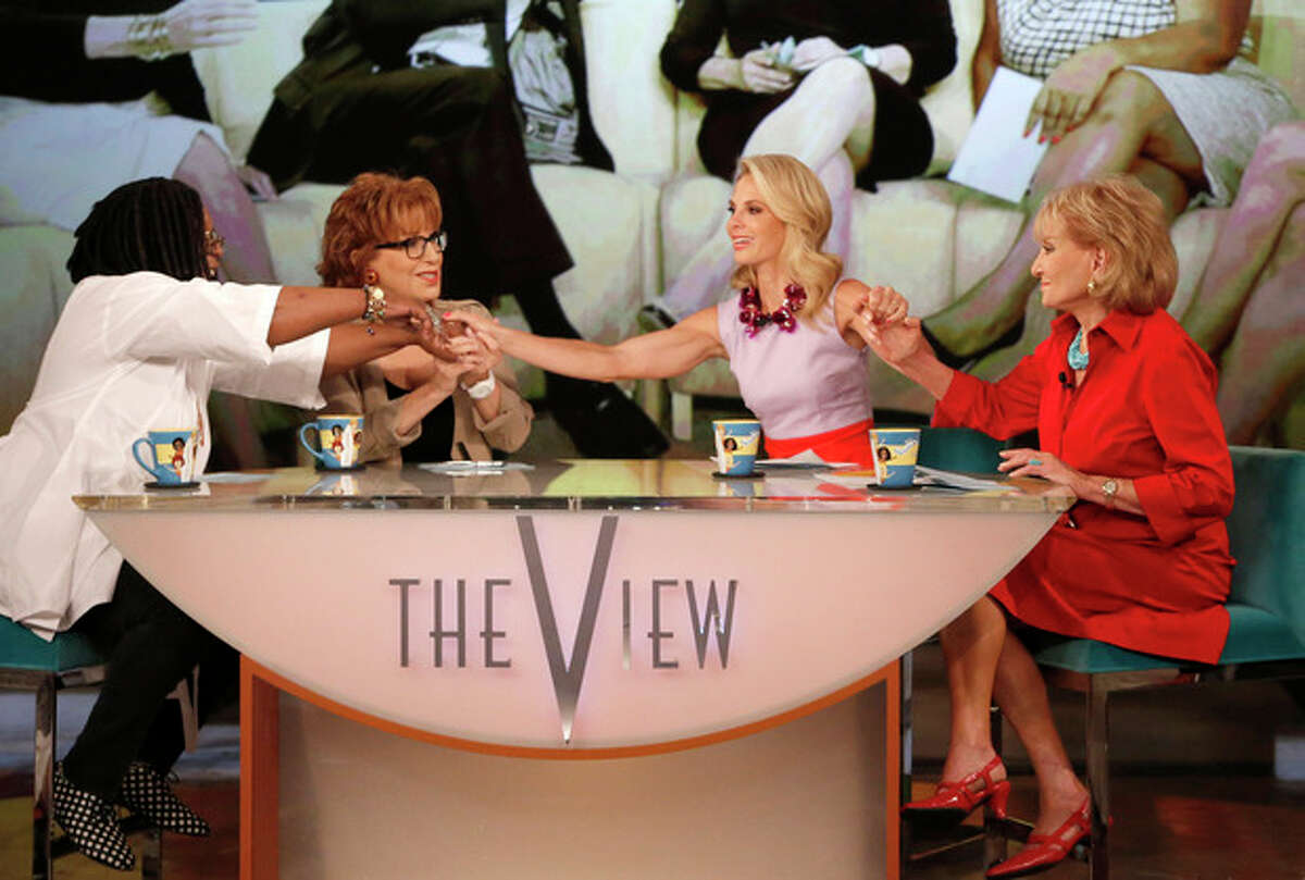 This image released by ABC shows, from left, Whoopi Goldberg, Joy Behar, Elisabeth Hasselbeck and Barbara Walters, co-hosts on "The View," during a broadcast on Wednesday, July 10, 2013, in New York. Wednesday was Hasselbeck's last day on the daytime talk show. Her exit came less than 24 hours after it was announced that Hasselbeck will join Fox News Channel and the "Fox & Friends" morning show in September. (AP Photo/ABC, Heidi Gutman)