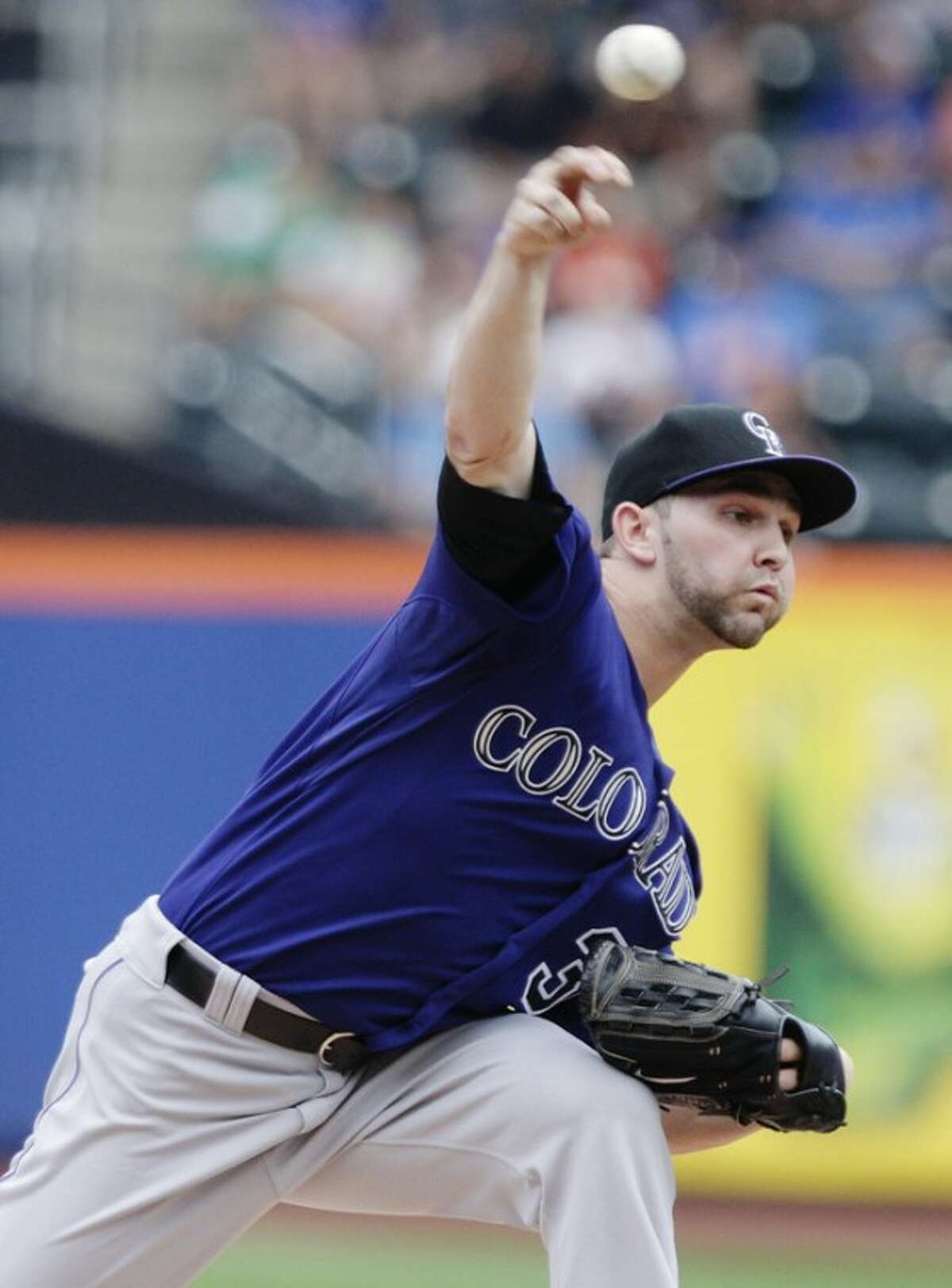 Colorado Rockies' Tyler Chatwood delivers a pitch during the first inning of a baseball game against the New York Mets, Thursday, Aug. 23, 2012, in New York. (AP Photo/Frank Franklin II)