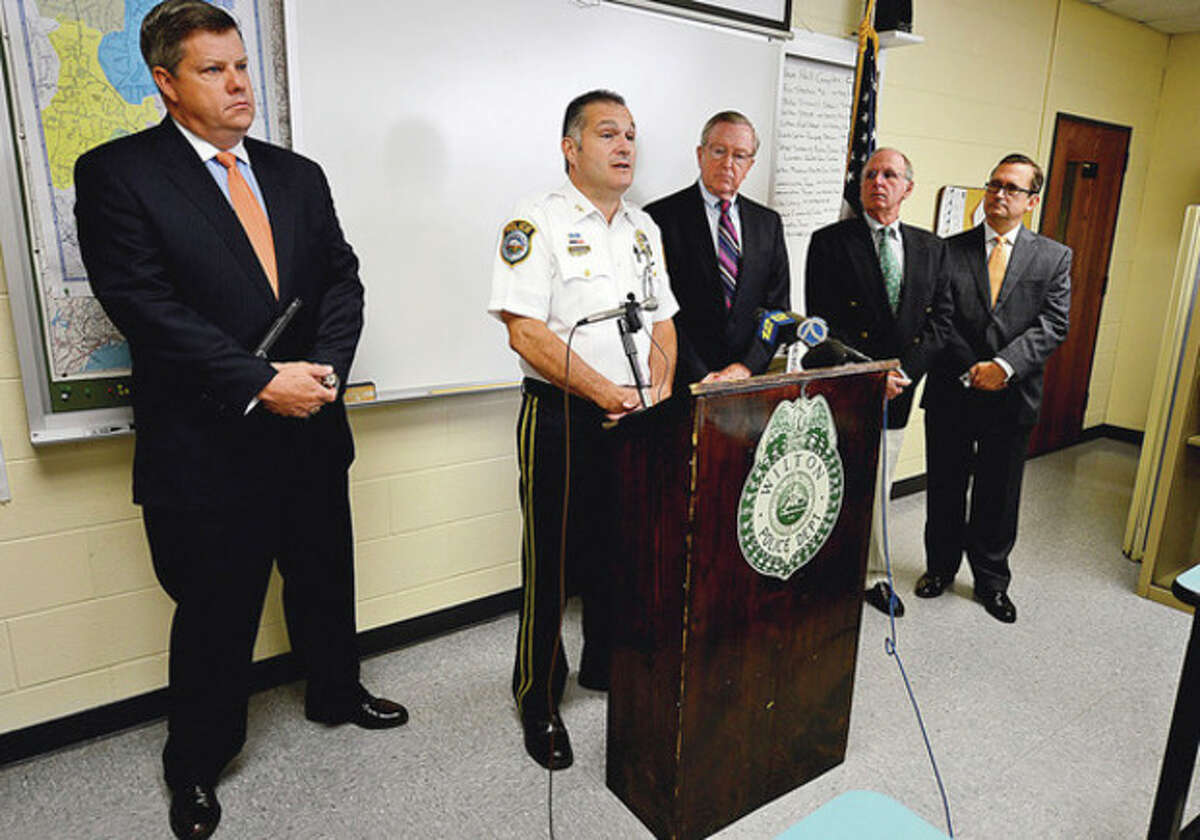 Wilton Police Chief Michael Lomabardo holds a press conference with first selectman Bill Brennan and police commisioners Christopher Weldon, Donald Sauvigne and David Waters to announce an arrest in the Nick Parisot killing. Hour photo / Erik Trautmann