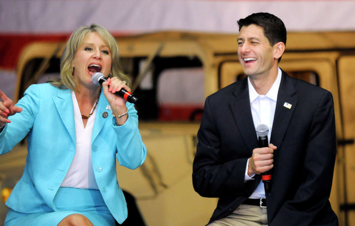 Rep. Renee Ellmers, R-N.C., and Republican vice presidential candidate, Rep. Paul Ryan, R-Wis., answers questions during campaign event at Partnership for Defense Innovation in Fayetteville, N.C., Thursday, Aug. 23, 2012. (AP Photo/Sara D. Davis)