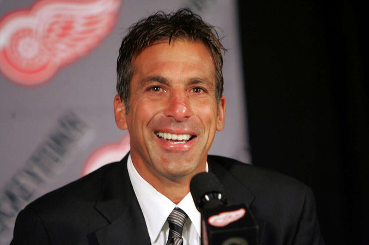 FILE - In this Aug. 31, 2010 file photo, Chris Chelios talks about his retirement from the National Hockey League and his new role with the Detroit Red Wings during a news conference in Detroit. Defensemen Scott Niedermayer and Chelios, along with forward Brendan Shanahan have been picked for the Hockey Hall of Fame. (AP Photo/Detroit Free Press, William Archie, File) ** DETROIT NEWS OUT MAGS OUT NO SALES MANDATORY CREDIT **