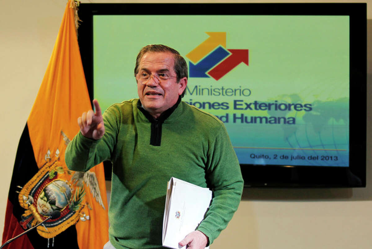 Ecuador's Foreign Minister Ricardo Patino gestures after a press conference in Quito, Ecuador, Tuesday, July 2, 2013. Patino said Ecuador is still considering the request for political asylum by NSA leaker Edward Snowden, but acknowledged that the former agent is under the jurisdiction of Russia's government. (AP Photo/Dolores Ochoa)