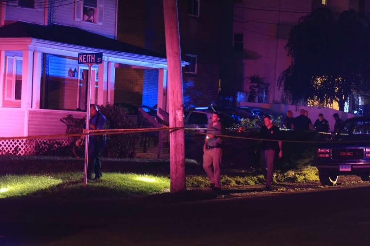 Police investigate shooting on Taylor Avenue Thursday night.