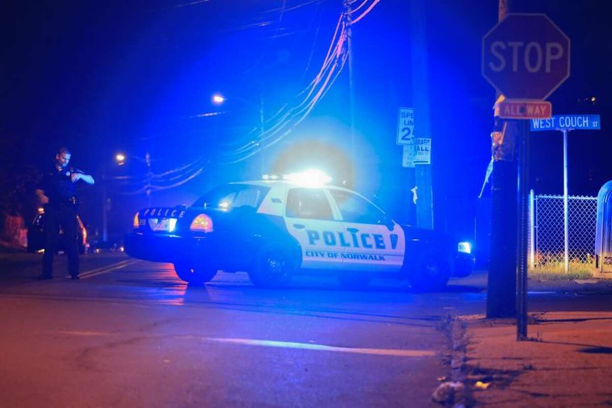 Police investigate a reported shooting on Taylor Avenue Thursday night.