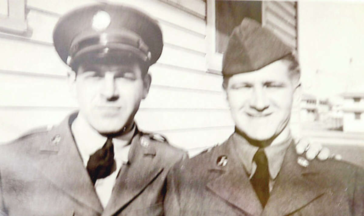 Hour photos / Erik Trautmann Everett Hersom, right, has reached out to Norwalk in search of former U.S. Army buddy, James Giordano, left, who died in 1991.