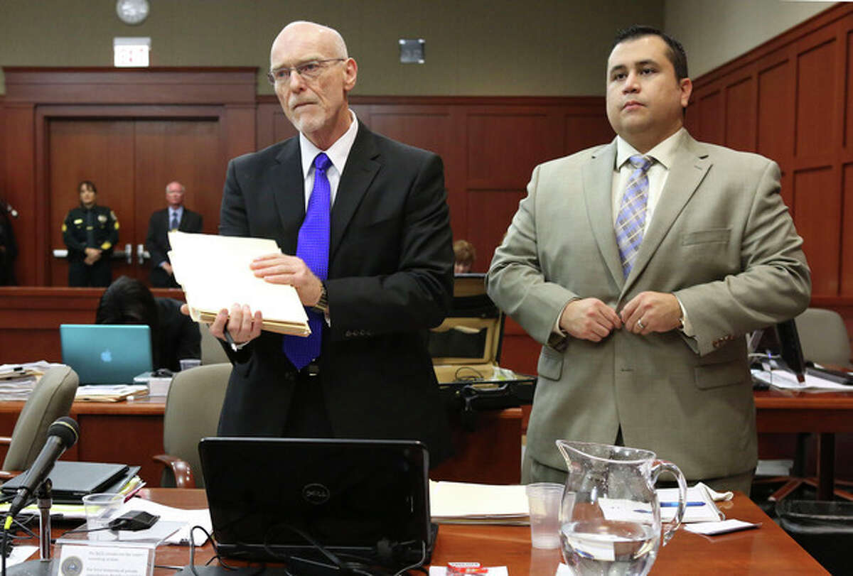 George Zimmerman, right, stands next to one of his defense attorneys, Don West, during his trial in Seminole circuit court, Friday, July 5, 2013 in Sanford, Fla. Zimmerman has been charged with second-degree murder for the 2012 shooting death of Trayvon Martin. (AP Photo/Orlando Sentinel, Gary W. Green, Pool)