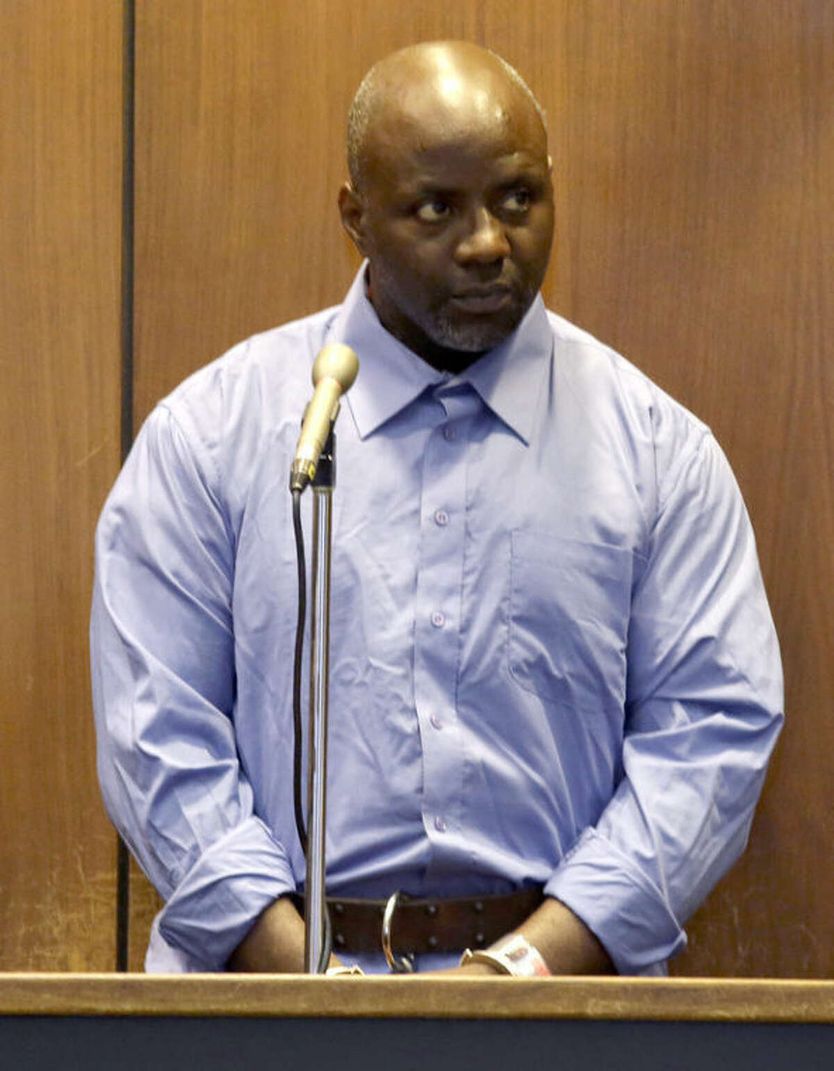 Shawn Custis appears in front of Judge Peter Vazquez for his arraignment at Essex County Superior Court, Tuesday, July 2, 2013, in Newark, N.J. Custis, 42, was arrested in connection with a violent home invasion on June 21, that left a mother beaten in an attack that was captured by nanny cam. (AP Photo/Julio Cortez)
