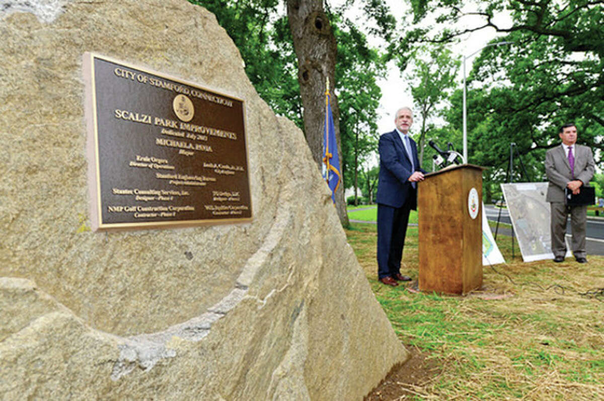 Hour photo / Erik Trautmann Above, President of the Board of Representatives, Randall Sigen speaks on Thursday when the renovated Scalzi Park was officially reopened.