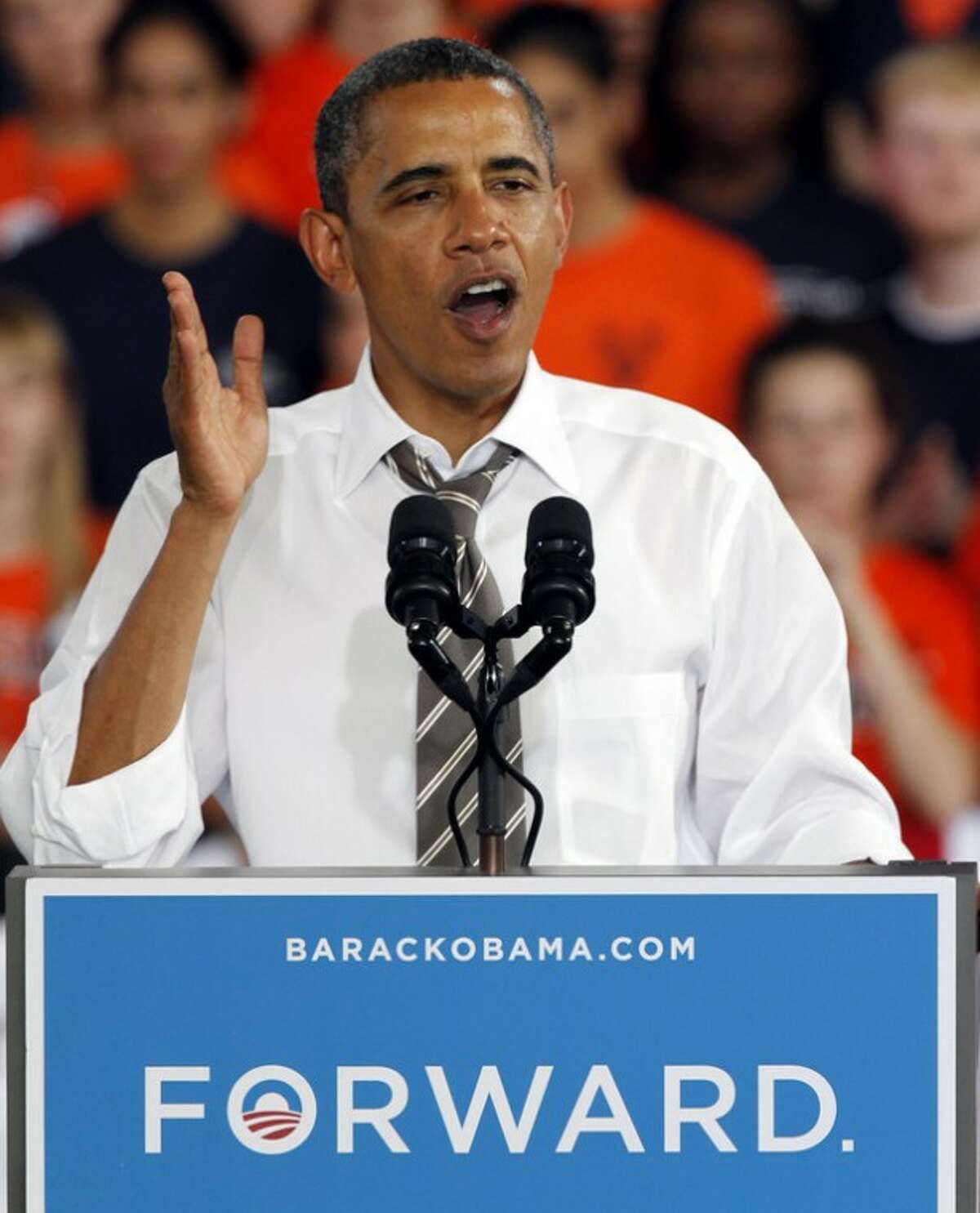 President Barack Obama gestures during a rally in Charlottesville, Va., Wednesday, Aug. 29, 2012. (AP Photo/Steve Helber)