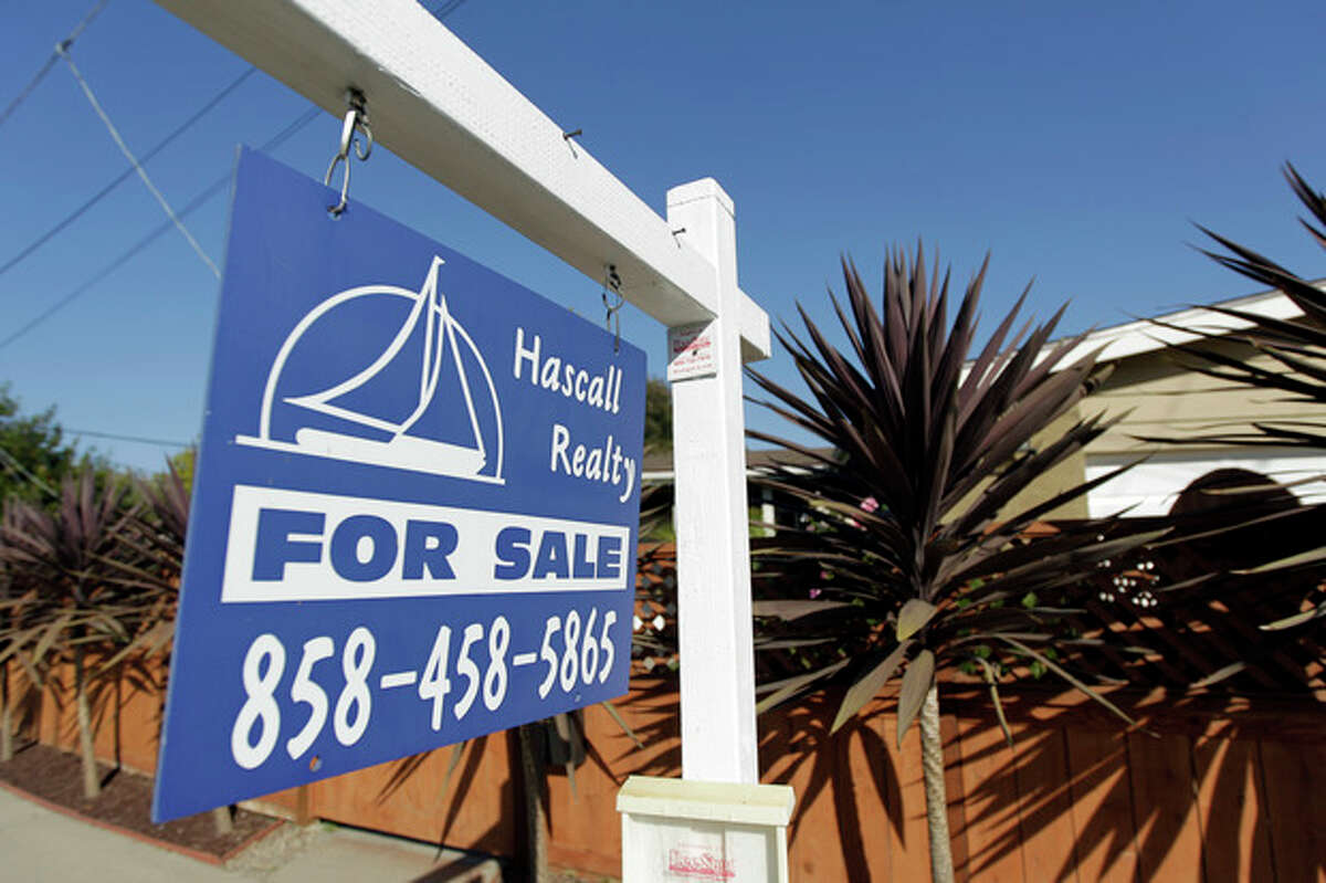 FILE-This June 13, 2012, file photo, shows a house for sale in San Diego. US home prices rose in all major US cities in June, further evidence of housing rebound. (AP Photo/Gregory Bull, File)