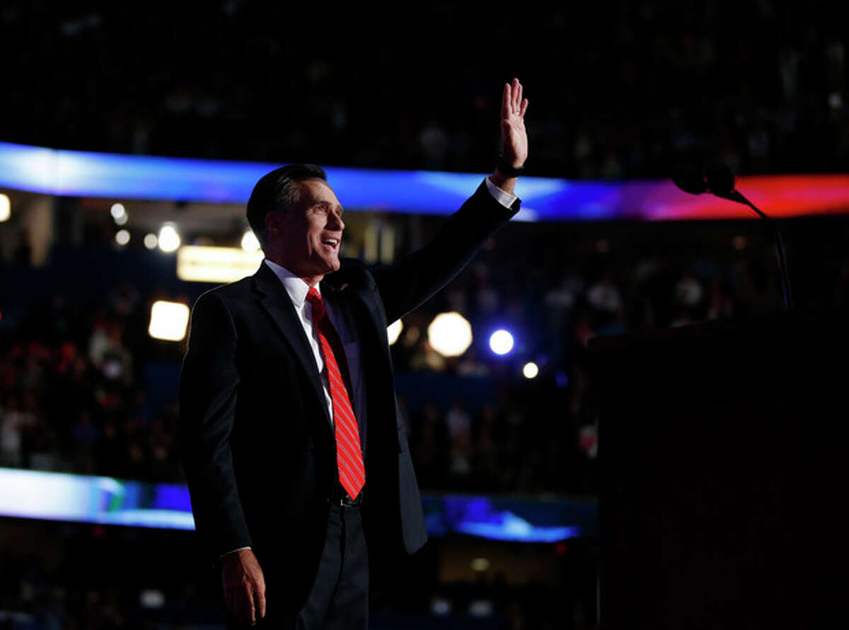 Republican presidential nominee Mitt Romney acknowledges delegates before speaking at the Republican National Convention in Tampa, Fla., on Thursday, Aug. 30, 2012. (AP Photo/Jae C. Hong)
